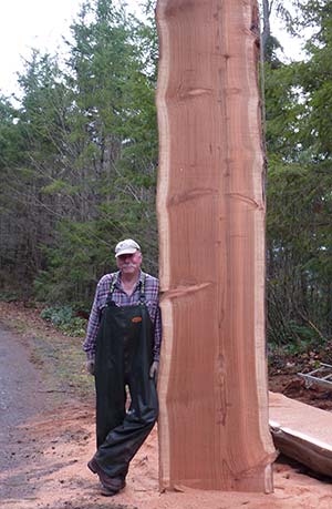 Jim with a large redwood slab that he milled.