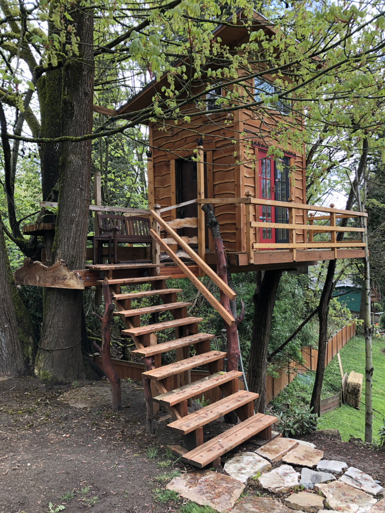 Customer crafted tree house with live edge lumber